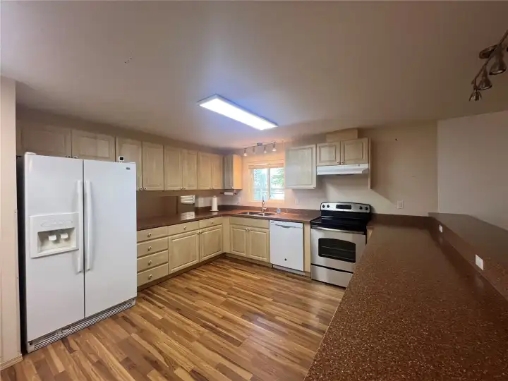 Kitchen has tons of storage and counter space