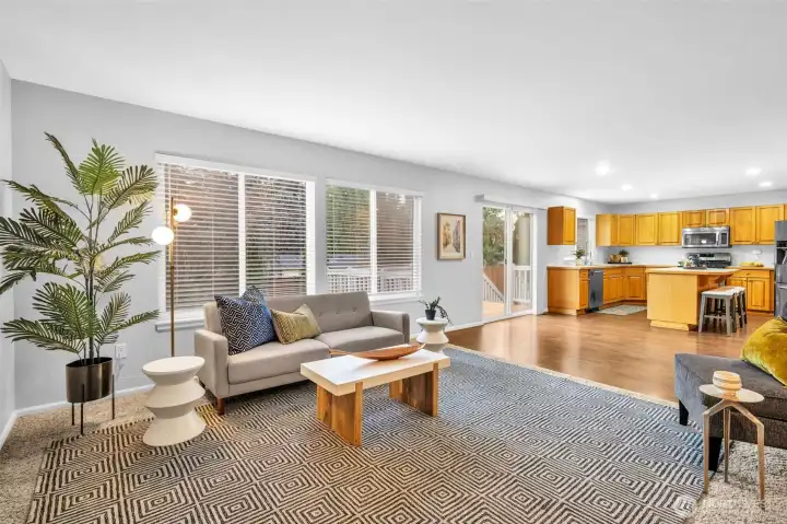 Family room off kitchen with see through fireplace