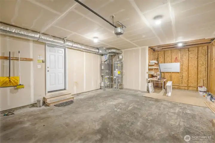 Workshop area in the backside of the garage is great for hobbies or storage.