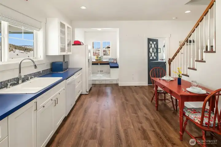 Bright, light and airy best describes this lovely kitchen/dining space...