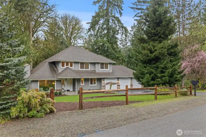 Welcoming grounds! Sprinkler system in the front yard.
