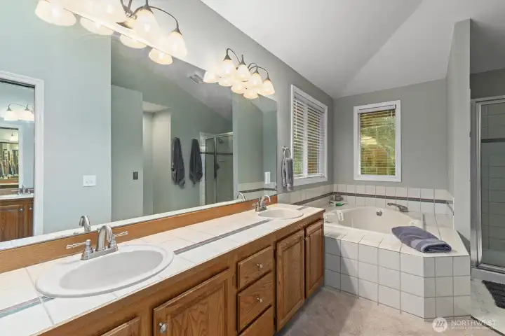 Spacious 5-piece primary bathroom.