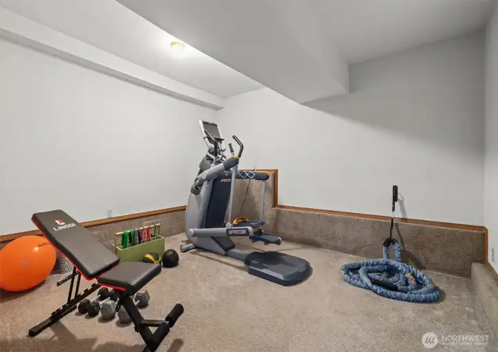 Now to the basement. This room is being used as exercise space.