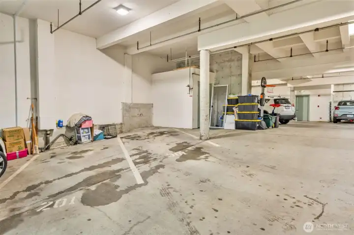 Unit features dedicated full size parking space - height is no issue   Access to stair or elevator in garage