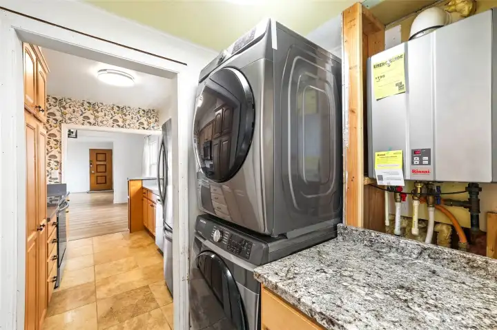 Additional storage and laundry at back of kitchen