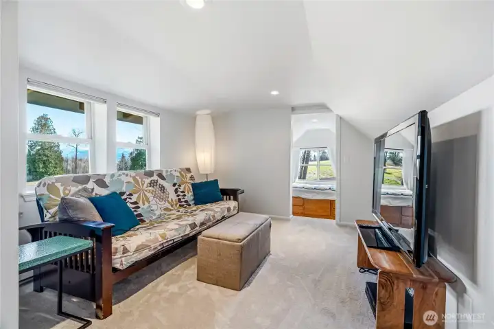 Upstairs loft with 1 bedroom, 1/2 bath, plus bonus room and tv room