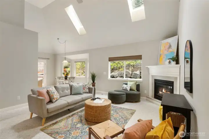 Light filled living room with vaulted ceilings and skylights!