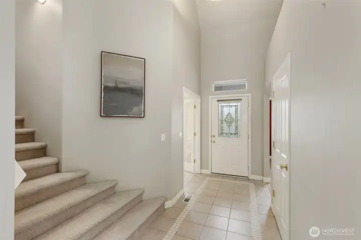 Grand entryway...French doors to the left lead to main floor office and to the right, dining room.