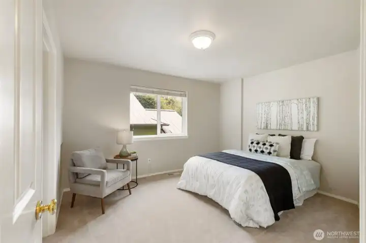 Upstairs guest bedroom 1.