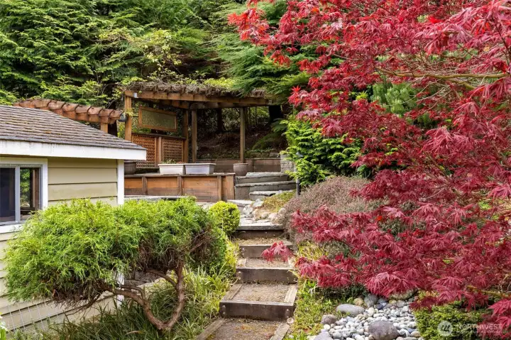 Winding paths, mature landscaping and sweet spots to relax and take in nature!