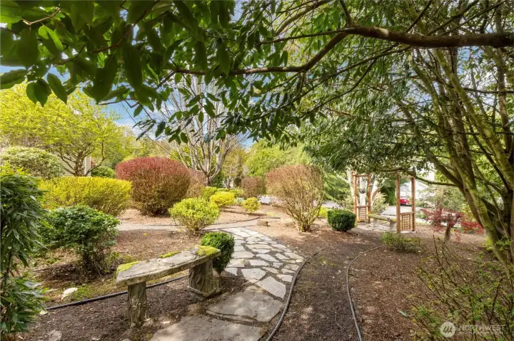 Winding paths, mature landscaping and sweet spots to relax and take in nature!