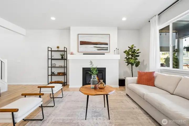 Gas fireplace with a huge custom mantel.
