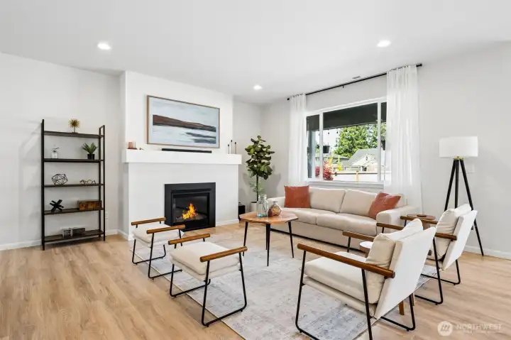 The living room looks into your private back yard. Your largest sectional would still fit perfectly in here.