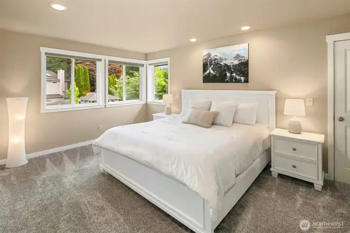 Primary Bedroom with walk in closet and extra storage area