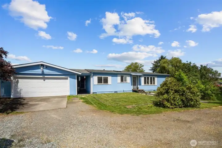 Two car garage with shop space and roof was installed about 5 years ago. Two car garage with shop space and roof was installed about 5 years ago.