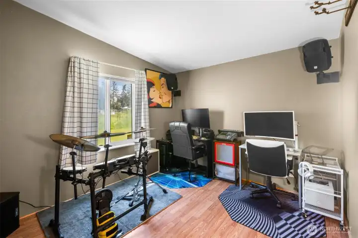 Second bedroom with newer laminate flooring. Also great for an office! Second bedroom with newer laminate flooring. Also great for an office!