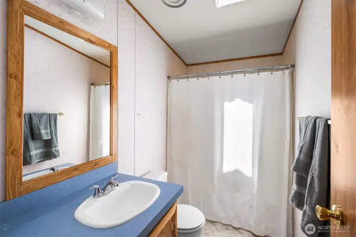 Full size hall bath! And it's a bonus to be on public water. Full size hall bath! And it's a bonus to be on public water.
