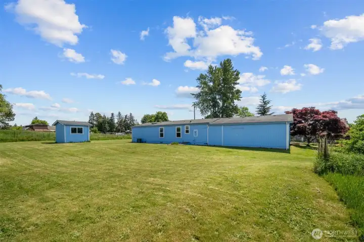 Beautifully surrounded by nature landscape and centrally located close to everything you need. The outbuilding is a storage shed. Beautifully surrounded by nature landscape and centrally located close to everything you need. The outbuilding is a storage shed.