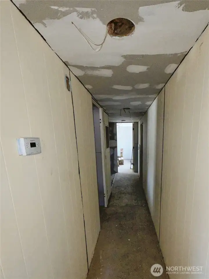 Hallway to bedrooms from kitchen