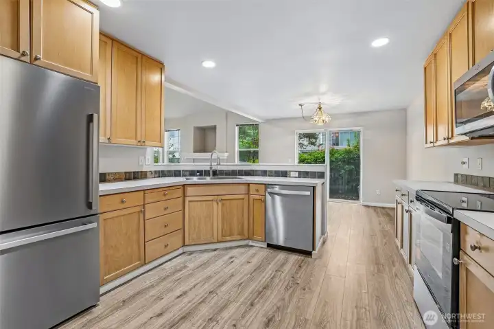 Brand new stainless steel appliances.
