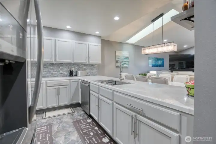 Open bright kitchen with plenty of storage Open bright kitchen with plenty of storage