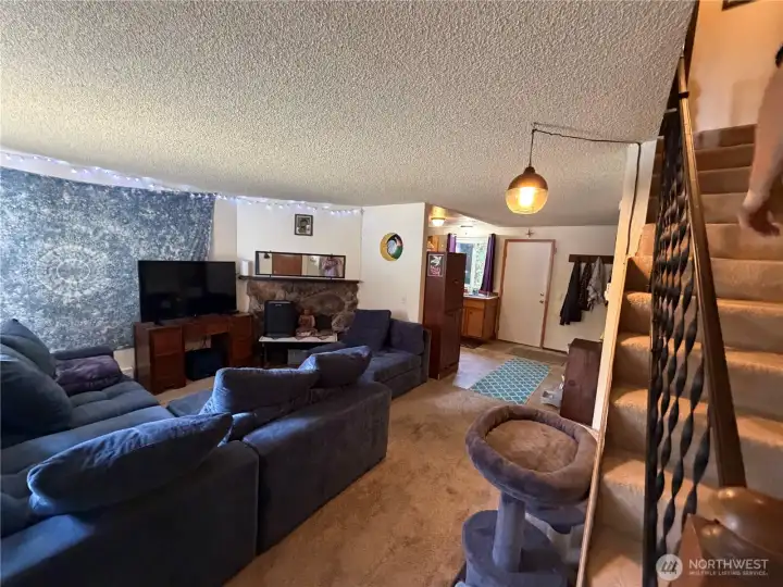 Living area of unit 2026 with stairs to right of frame Living area of unit 2026 with stairs to right of frame