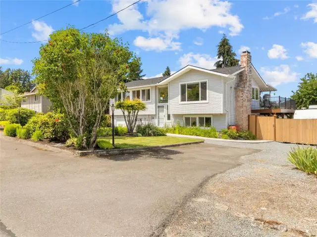 Welcome to this gorgeous Summit Area Split level in Puyallup!! One of two Driveways. There is a large gate on this side to access yard to store your toys! RV/BOAT? You have the space and no CCRS or HOAS here!