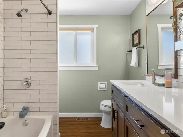 Good sized shared Jack & Jill bathroom with lovely finishes.