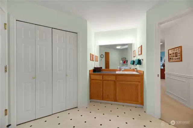 Laundry room also has a closet for storage.