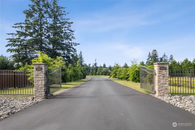 Elegant gated driveway ensures privacy and peace of mind.