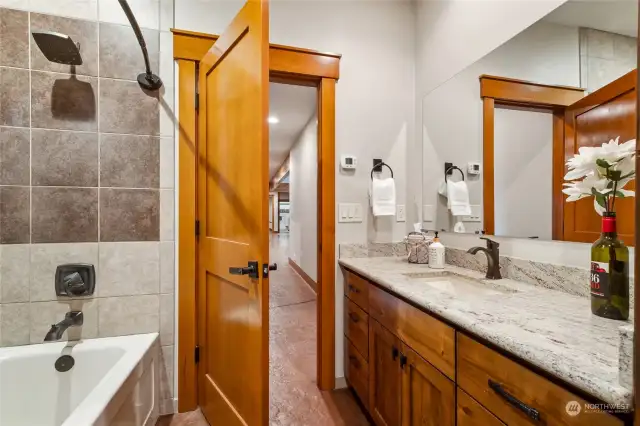 One of two fresh bathrooms on the lower level. This one located near the bedrooms, the other nearby to the gym and pool.