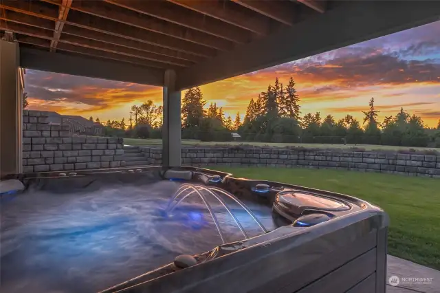 On the lower patio, just outside the recreation room, the hot tub provides the ultimate relaxation. Luxuriate with a backdrop of nature's beauty.