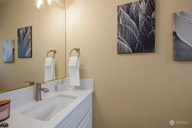 Main floor powder room with new quartz countertops.