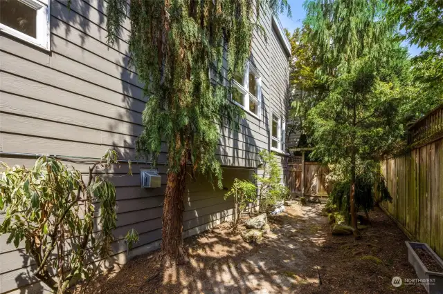 Fully fenced and low maintenance landscaped back garden.  Home has a sprinkler system for watering.