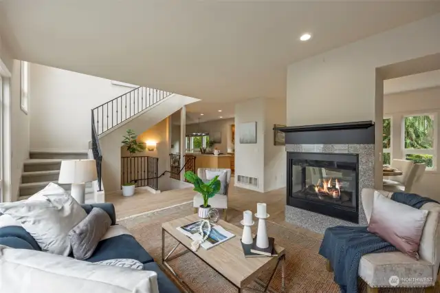 View from the living room towards the kitchen.  The high ceilings enhance the sense of space and light, providing a luxurious atmosphere for both everyday living and entertaining.