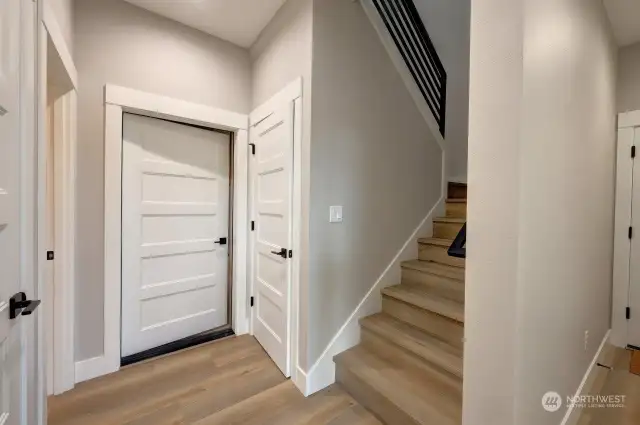 Door on left unfinished area, stairs upstair w/under stair storage