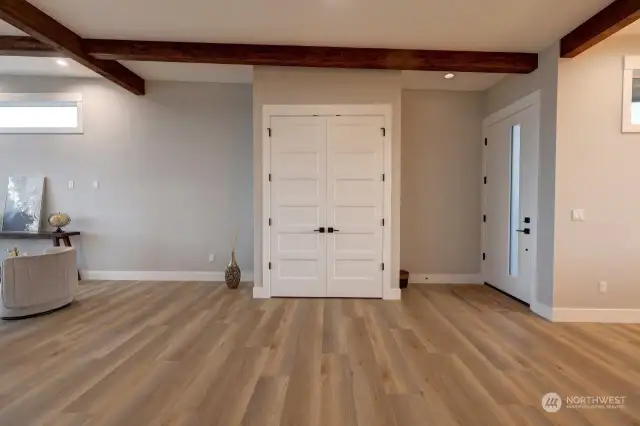 Entry way on right, double door is closet