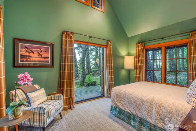 Sauna Cottage front deck/entrance, one of two entryways. Vaulted ceilings, large walk-in closet and big windows. You will love the feeling of the wool window treatments.