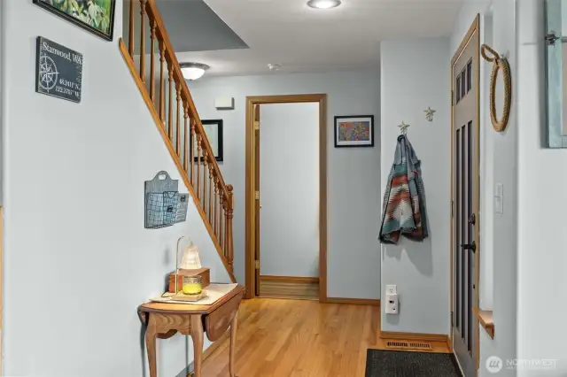Entry, half bath & staircase
