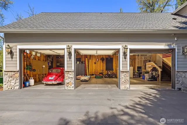 Tremendous space in this 3 car garage with large full length storage overhead