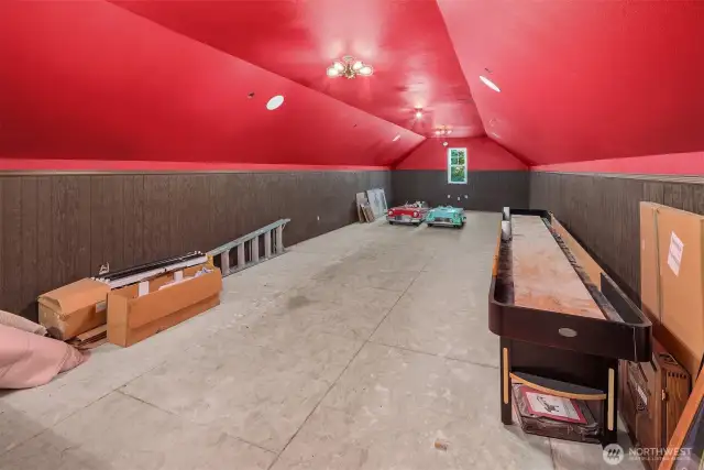 Tremendous space in this 3 car garage with large full length storage overhead