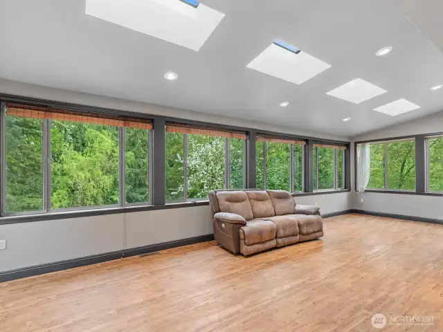 Huge sunroom off of the kitchen