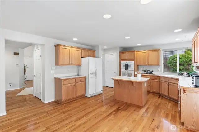 View of kitchen into the entry on left