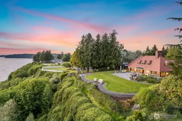 Welcome Home! Breathtaking views and immaculate grounds, this Des Moines waterfront estate on 1.32 acres with 150’ of waterfront and beach access is awe-inspiring and one-of-a-kind.