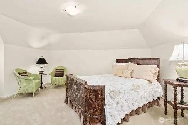 The upper floor boasts three spacious bedrooms, all with window seats to relax and soak in the views