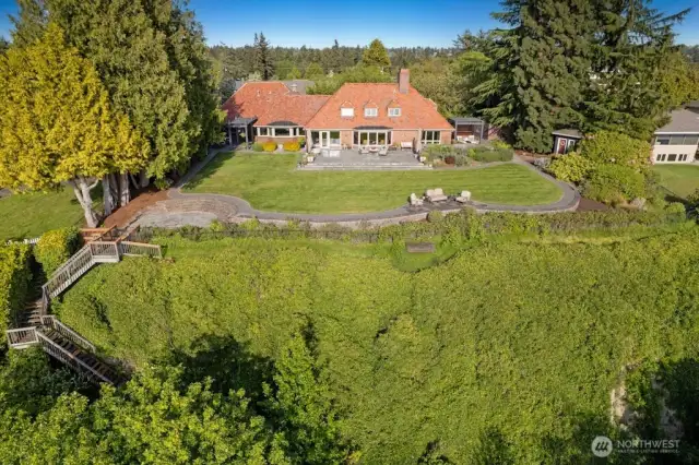 Estate is 2nd to none, located on a double lot, with stairs and pathway for beach access that extends to water edge.