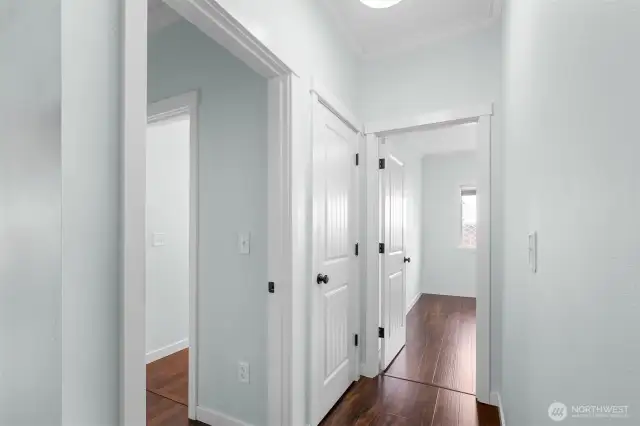 Hallway leads to Primary and one guest bedroom.