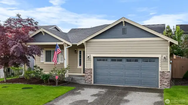 Pleasing two-tone color palette with stone accents.