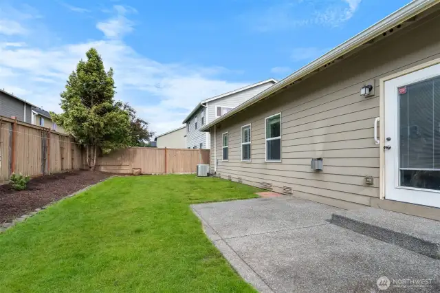 Enjoy grilling on the patio in summertime. Door opens from Living room.