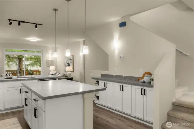 newly updated kitchen w/ SS appliances, 5 burner gas range, new carpeting, refinished cabinets & new countertops